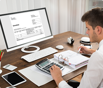 A man working with invoice process