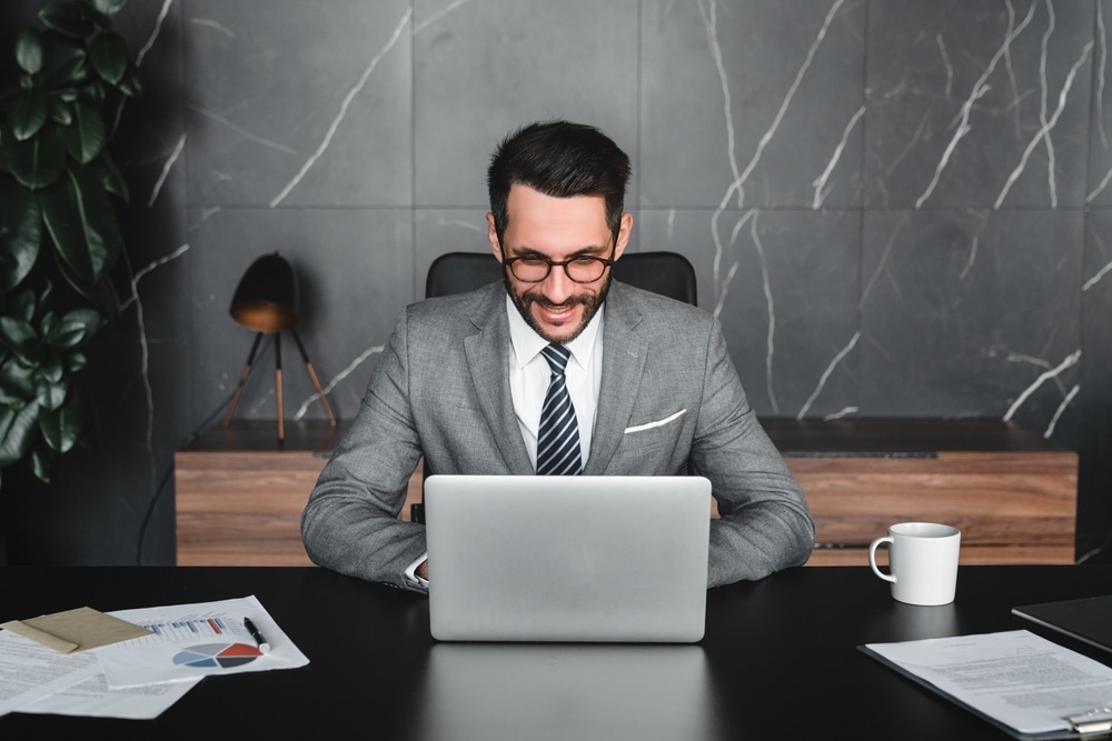 A man working on the proactive tax planning guide